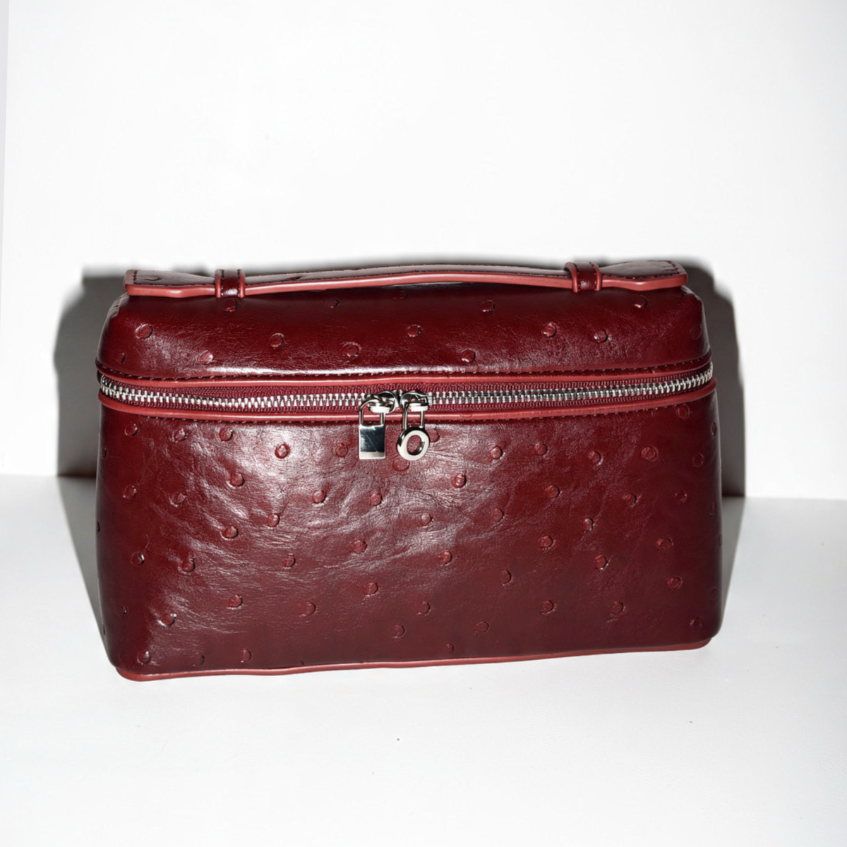 KAYLA BAG OSTRICH IN BURGUNDY